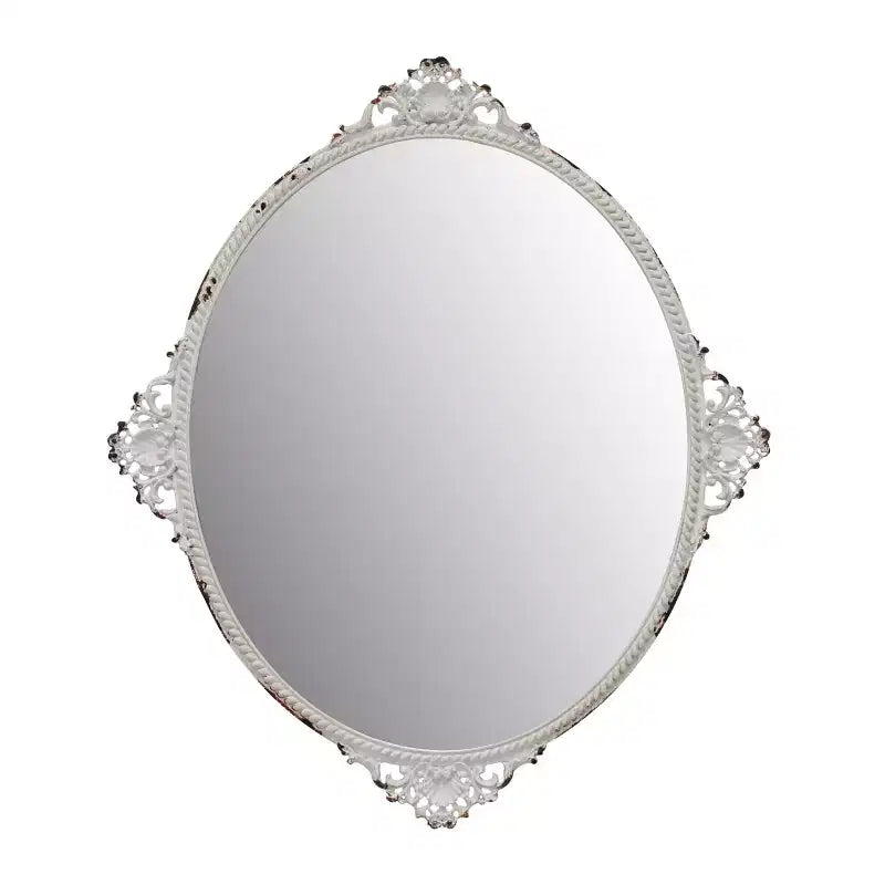 Miroir mural ovale en métal antique