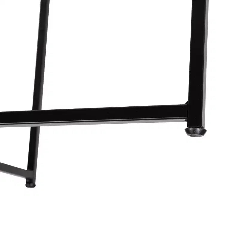 Table basse en verre avec piètement métallique croisé