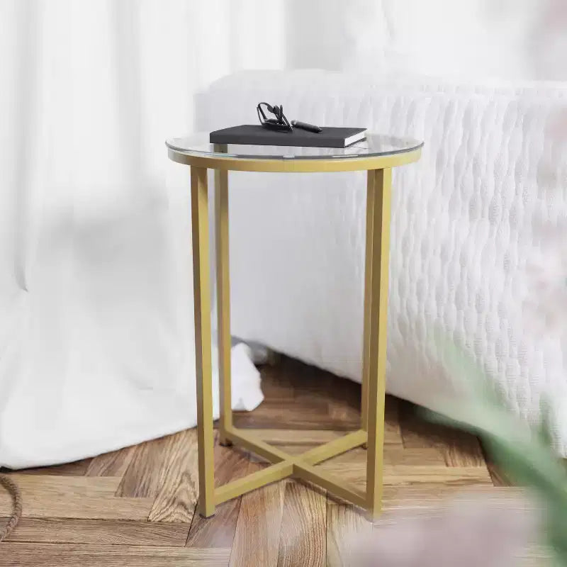Table basse en verre avec piètement métallique croisé
